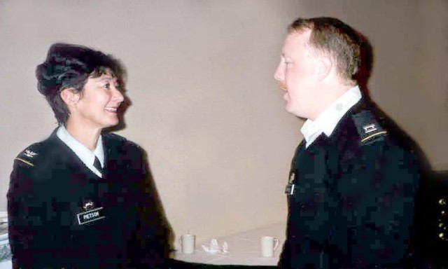 Col. Coral Wong Pietsch, chief judge (IMA) talks with Capt. Dave Whitney of the 12th Legal Support Organization. In her civilian job, Pietsch serves on the staff of Headquarters, U.S. Army Pacific. In his civilian job, Whitney serves on the staff...