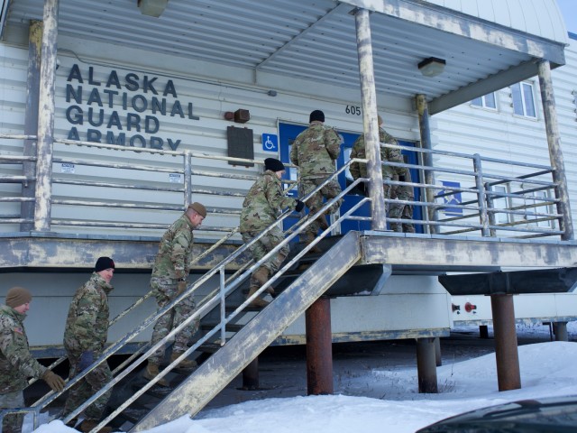 National Guard Arctic Interest Council delegates representing the Alaska, Michigan, Minnesota, Montana, New Hampshire and North Dakota National Guard and the National Guard Bureau tour the Kotzebue National Guard Armory March 29, 2022. The armory is one of 19 armories statewide and serves the region surrounding the Northwest Arctic Borough. (Alaska National Guard photo by Capt. David Bedard)