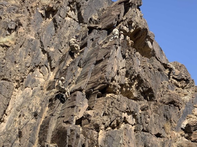 U.S. Army Soldiers from 3rd Battalion, 172 Infantry (Mountain) Headquarters Company and C Company, Vermont National Guard, conduct mountain training with Royal Saudi Land Forces at the RSLF Mountain Warfare School in Saudi Arabia. About 70 U.S. Army Soldiers attended the training in October and November. (Courtesy)