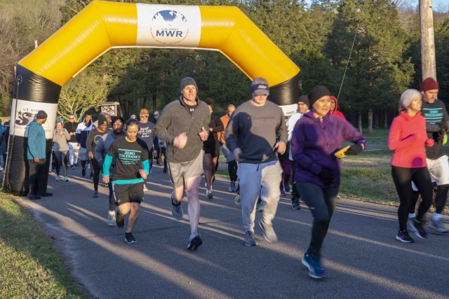 Redstone Arsenal personnel and Family members participated in an early morning 5K run and one mile walk in honor of Sexual Assault and Awareness and Child Abuse Prevention Month April 1, 2022, on the installation.