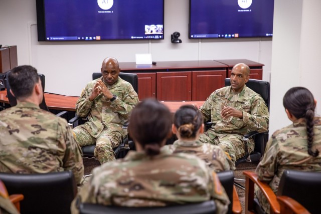 Lt. Gen. Gary Brito, right, deputy chief of staff G-1 Personnel of The United States Army, and  Sgt. Maj. Mark A. Clark, left, deputy chief of staff sergeant major G-1 Personnel of The United States Army, speak with a group of Soldiers from various units across Joint Base Lewis-McChord, Wash., during a focus group held on March 29, 2022. The focus group was conducted to discuss “Navigating Family Readiness”. (U.S. Army photo by Staff Sgt. Kyle Larsen, 201st Expeditionary Military Intelligence Brigade)