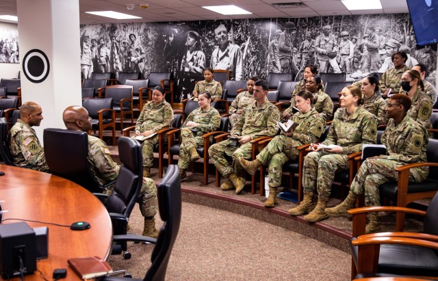 Lt. Gen. Gary Brito, left, deputy chief of staff G-1 Personnel of The United States Army, and  Sgt. Maj. Mark A. Clark, left-center, deputy chief of staff sergeant major G-1 Personnel of The United States Army, host a focus group with Soldiers from various units across Joint Base Lewis-McChord, Washington, March 29, 2022. The focus group was conducted to discuss “Navigating Family Readiness”. (U.S. Army photo by Staff Sgt. Kyle Larsen, 201st Expeditionary Military Intelligence Brigade)