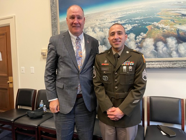 Staff Sgt. Gabriel Franco-Heredia, 114th Signal Battalion & 55th COMCAM poses for a picture with US Congressman and Maj. Gen. Trent Kelly, a Maj. of the Mississippi National Guard.
