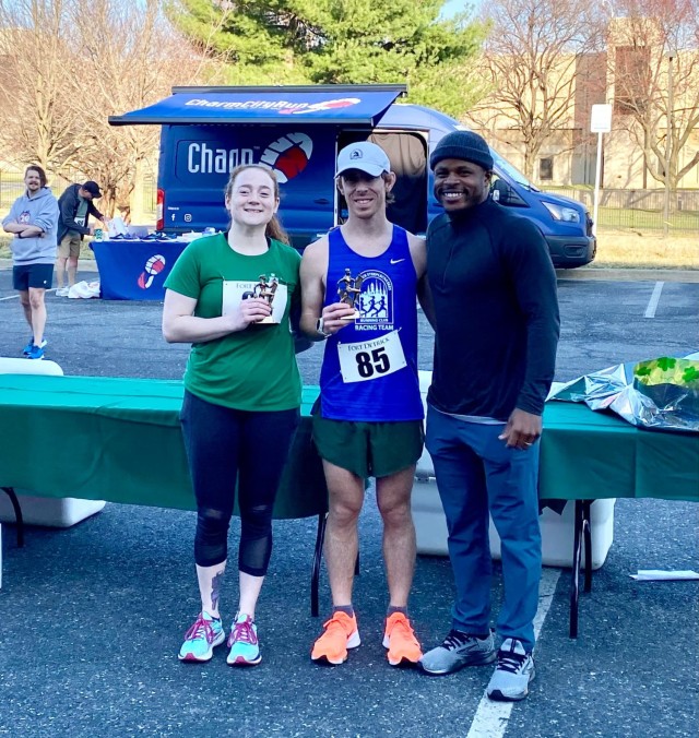 First place winners (pictured) were: Spc. Stephanie Delatola of A Co, 53d Signal Battalion, with a time of 21:19; and Arthur Leathers, with a time of 17:18. Both winners received sneakers from the event sponsor, Charm City Run.