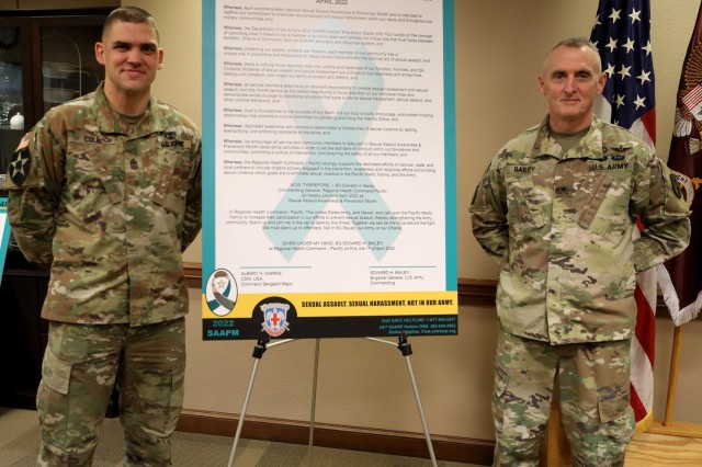 Sgt. Maj. Ryan Cole, left, acting command sergeant major of Regional Health Command-Pacific, and Brig. Gen. Edward H. &#34;Ned&#34; Bailey, commanding general of RHC-P, before signing a proclamation April 5 recognizing Sexual Assault Awareness and Prevention Month in the command. All service members have a responsibility to combat sexual assault and sexual harassment, and it’s everyone&#39;s duty to build, encourage, and sustain trusting relationships that promote a culture committed to upholding and living the Warrior Ethos.