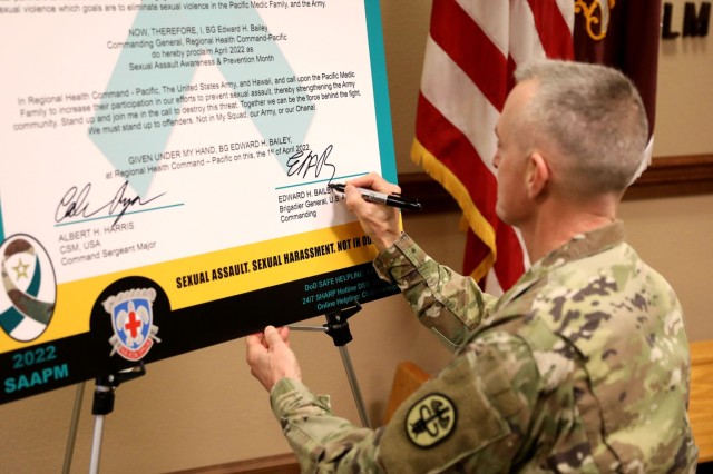 Brig. Gen. Edward H. &#34;Ned&#34; Bailey, commanding general of Regional Health Command-Pacific, signs a proclamation April 5 recognizing Sexual Assault Awareness and Prevention Month in the command. “There&#39;s no place in our Army for sexual harassment and assault, domestic violence, or other harmful behaviors that inhibit readiness,” Bailey said.