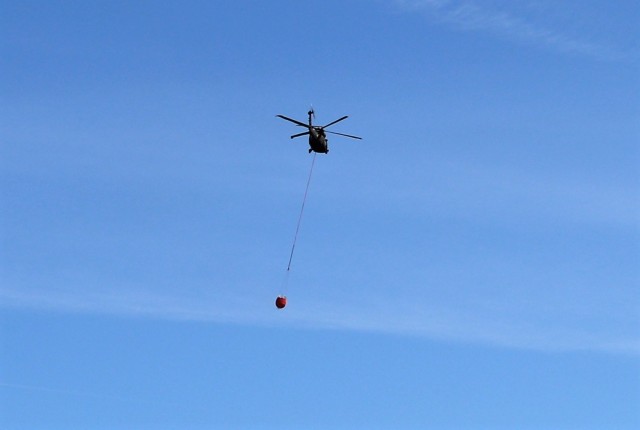 Federal, state agencies partner for fire-suppression training with UH-60 Black Hawks at Fort McCoy