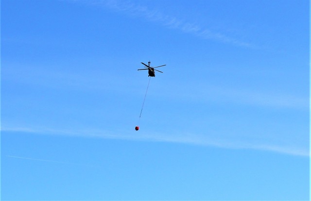 Federal, state agencies partner for fire-suppression training with UH-60 Black Hawks at Fort McCoy
