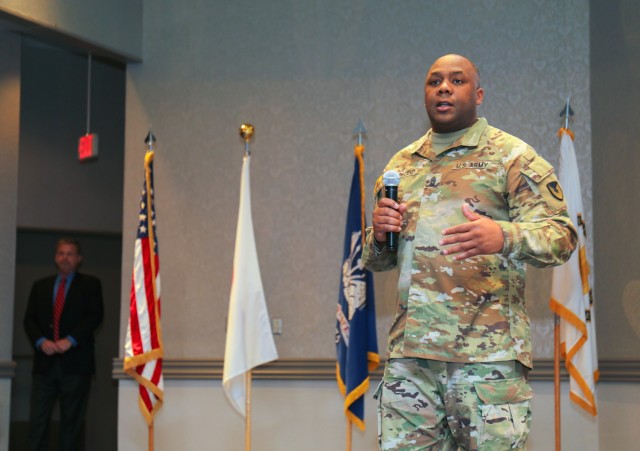 Command Sgt. Maj. Jason R. Copeland, senior enlisted leader for U.S. Army Installation Management Command-Pacific, speaks about career progression during a town hall meeting at the Camp Zama Community Club in Japan, April 12, 2022.