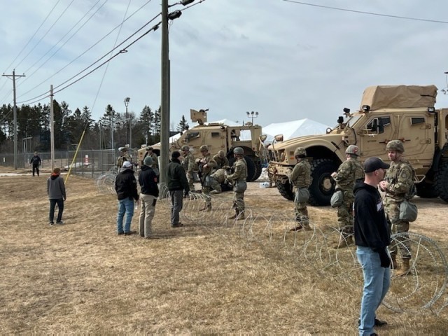 Michigan National Guard Soldiers conduct perimeter security during exercise Northern Exposure in the Upper Peninsula April 12, 2022. The four-day exercise enabled Guard members and local, state and federal partners to practice responding to natural disasters and other domestic emergencies. (Courtesy Photo).