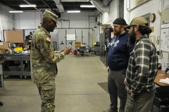 United States Army Aberdeen Test Center Commander Presents Coins to Recognize Exceptional Efforts by 2 ATC Technicians