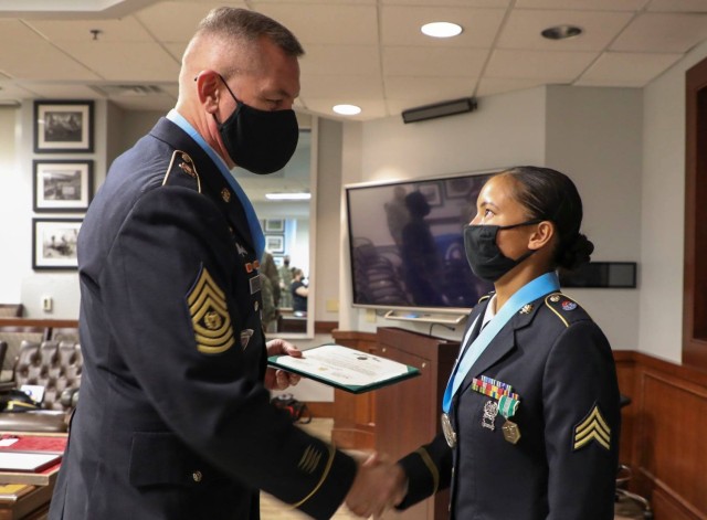 Command Sgt. Major Walker congratulates Audie Murphy inductee
