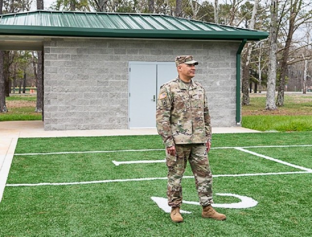 Garrison Command Sgt. Maj. Juan Jimenez stands by the storage building at the track. 
