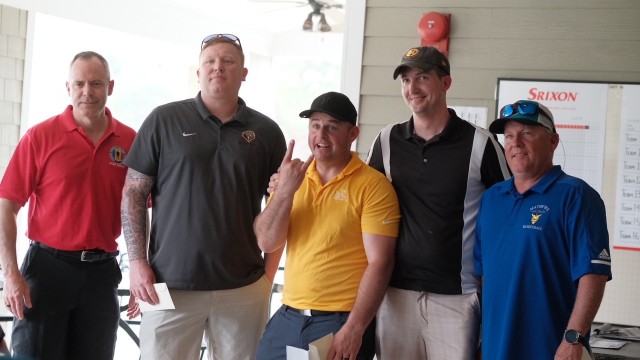 Brig. Gen. John D. Kline, commanding general, U.S. Army Center for Initial Military Training, Training and Doctrine Command presented the first place prize during the Fourth Annual SHARP Golf Tournament at Fort Eustis, Va. April 14
