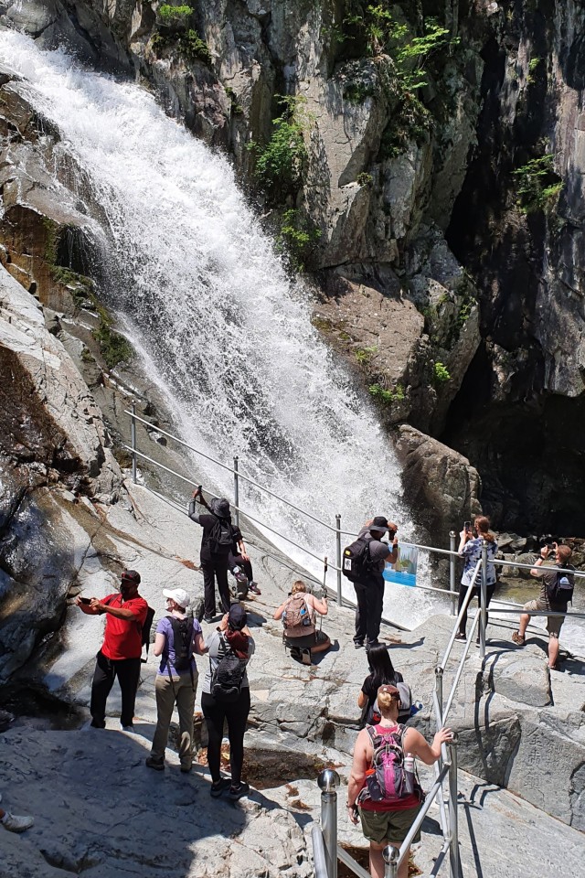 Participants of the 2021 Hiking Challenge explore the Bogyeongsa 12 Waterfalls, South Korea.