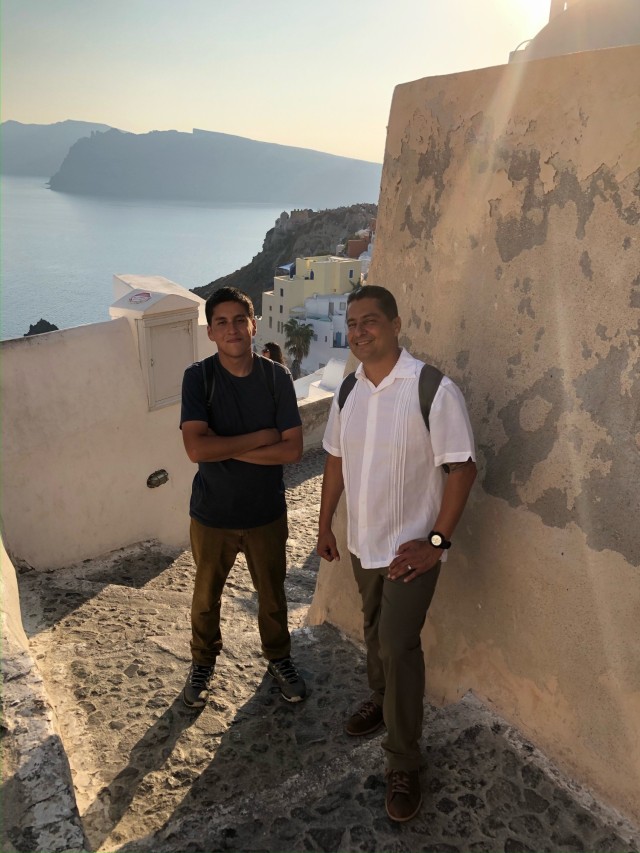 
Col. Bill Soliz and his son William vacationed in Santorini, Greece in 2019. Throughout his Army career the Soliz family moved their children 11 times and went through the process of establishing a network of autism caregivers at each new duty station. “We believe we were successful because we educated ourselves about autism and became our son’s advocate,” he said. 
