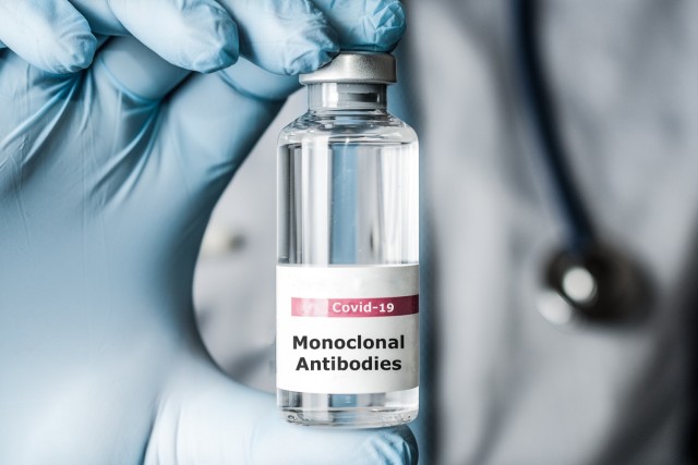 Doctor holds a vial of monoclonal antibodies, a new treatment for coronavirus Covid-19