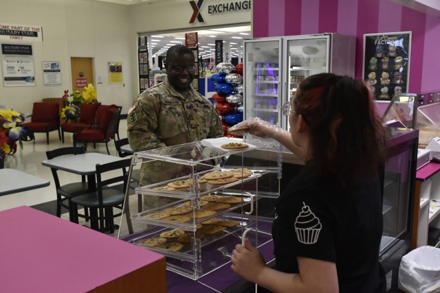 Sgt. Gregory Hamilton, from Company C, 31st Engineer Battalion, decides to try the cookies at G’s Cupcake Euphoria, a new restaurant in the Main Post Exchange – one of many new amenities that are either now open or opening soon around Fort Leonard Wood this year.