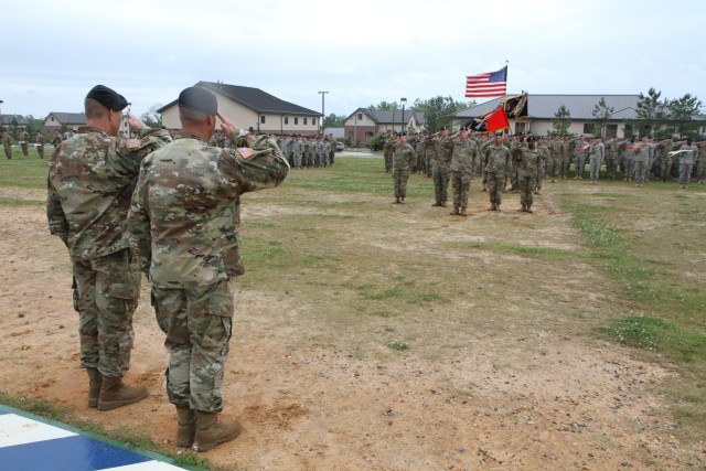 Maj. Gen. James Rainey, the commander of the 3rd Infantry Division, and Col. Michael Simmering, the commander of the 3rd Brigade Combat Team, salute the colors as the 3rd Brigade Combat Team change their colors during an inactivation ceremony during an inactivation ceremony, April 15.  After nearly 20 years of belonging to the Fort Benning community, the Sledgehammer Brigade closed a chapter on Kelley Hill with a ceremony.