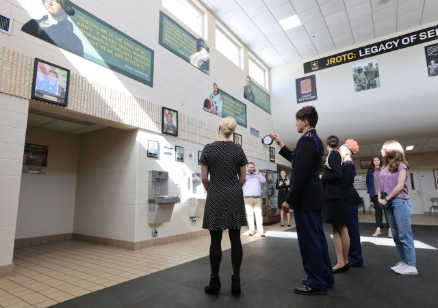 Senior Easton Colvin discusses his involvement in the Fort Knox Middle High School Junior ROTC program with Kentucky First Lady Britainy Beshear during her Month of the Military Child visit April 14, 2022.