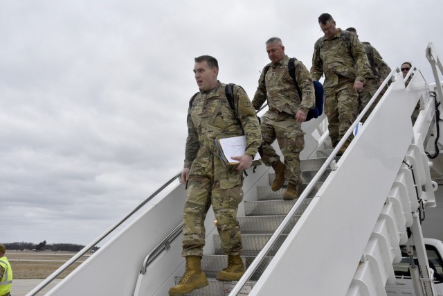 Approximately 140 Wisconsin Army National Guard Soldiers from the 107th Maintenance Company arrived at Volk Field Air National Guard Base, Wisconsin, April 16, 2022, following a nine-month deployment to Poland, Romania and Lithuania in support of Operation Atlantic Resolve. Seven Minnesota Army National Guard Soldiers, who serve in a company detachment at Camp Ripley, Minnesota, were also part of the deployment. (Photo by Vaughn R. Larson)