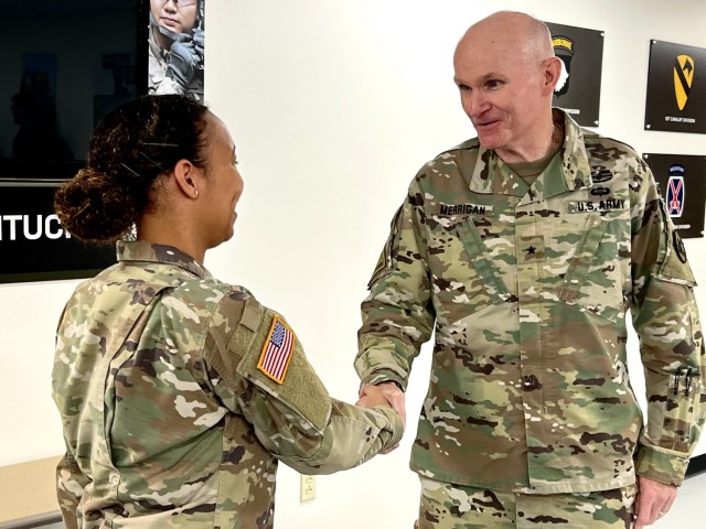 84th Training Command Deputy Commanding General Edward Merrigan awards Soldier for excellence.