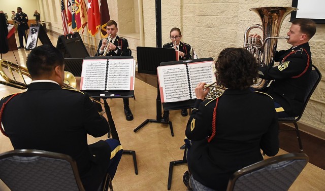 Ceremony marks new name for RIA Health Clinic to Woodson Health Clinic, honoring World War II combat medic