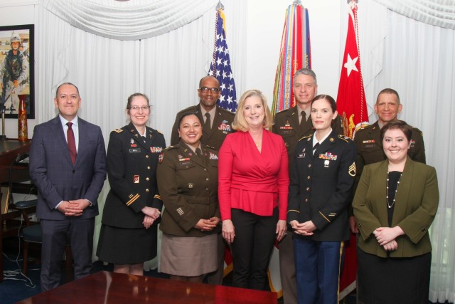 Army senior leaders join policy contributors from across the force to sign the Parenthood, Pregnancy and Postpartum Army directive on April 19, 2022 at the Pentagon. Pictured from left to right first row: Gabriel Camarillo, Undersecretary of the Army; Lt. Col Kelly Bell; Maj. Sam Winkler; Christine E. Wormuth, Secretary of the Army; Staff Sgt. Nicole Pierce; Amy Kramer. Second row from left to right: Lt. Gen. Gary Brito, Army G-1; Gen. Joseph M. Martin, vice chief of staff of the Army; Command Sgt. Maj. Michael Grinston, sergeant major of the Army.