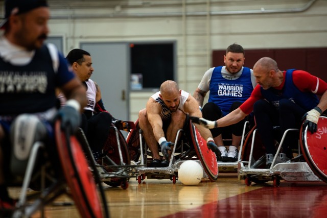 Retired U.S. Army Staff Sgt. Shawn Runnells prepares to compete in the 2022 Invictus Games by training in wheelchair rugby during the 2022 Invictus Games Team U.S. Training Camp, Fort Belvoir, Virginia, April 11, 2022. Team U.S is a part of more than 500 participants from 20 countries who will take part in The Invictus Games The Hague 2020 featuring ten adaptive sports, including archery, field, indoor rowing, powerlifting, swimming, track, sitting volleyball, wheelchair basketball, wheelchair ruby, and a driving challenge.