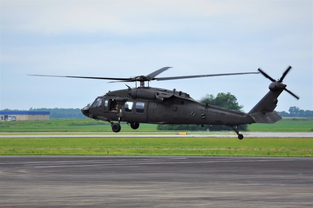 A UH-60V Black Hawk hovers during a demonstration flight at the Huntsville, Al. International Airport July 13.  The Program Executive Office of Aviation’s Utility Helicopter Project Office hosted the flight as part of a programmatic update for several senior Army National Guard Aviation Officers in preparation for the aircraft becoming part of the ARNG fleet.  The first UH-60V aircraft are projected to be delivered to the Eastern Area ARNG Aviation Training Site, Fort Indiantown Gap, Pa. the last week of July which will be the First Unit Equipped with the helicopters. The UH-60V, a retrofit UH-60L model, includes many updates, most notably a modernized glass cockpit similar to that found in the UH-60M. (Photo by Nathaniel Letson)