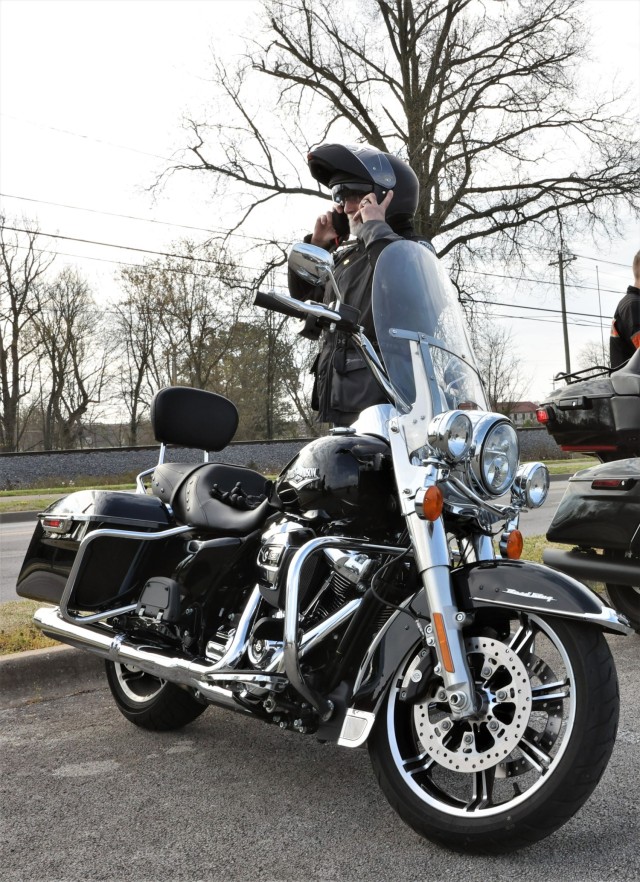 Riders ready themselves for heading off on the April 22, 2022 motorcycle safety check ride in the Lindsey Golf Course parking lot.