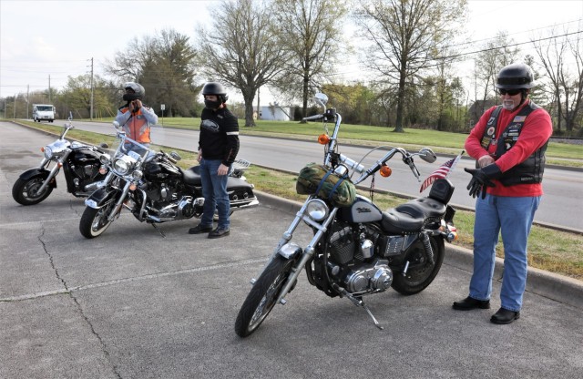 Riders ready themselves for heading off on the April 22, 2022 motorcycle safety check ride in the Lindsey Golf Course parking lot.