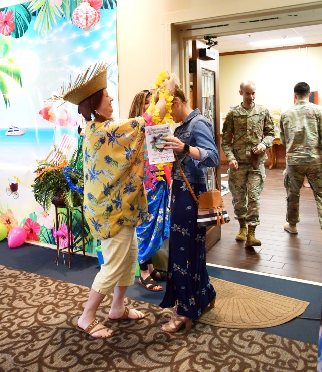 As volunteers, Family members and the community entered the Warrior Center, they were presented with leis to get them into the spirit of the event.