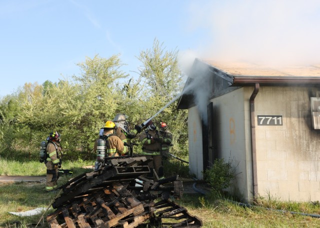 Firefighters from six different departments work to extinguish flames April 27, 2022 as part of a multi-department training exercise at Fort Knox.