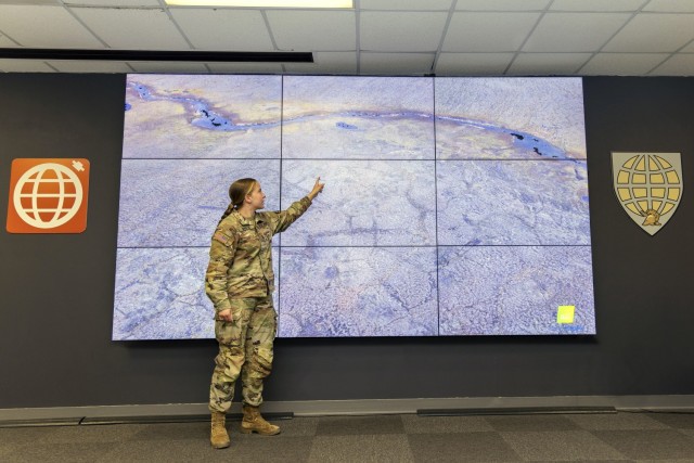 United States Military Academy Cadet Nicole Wantlin demonstrates her ability to take data collected over years of Arctic thaw cycles and view the landscape in 3D through virtual reality technology to detect changes in terrain features on April 21, 2022, at Washington Hall on the USMA campus. 