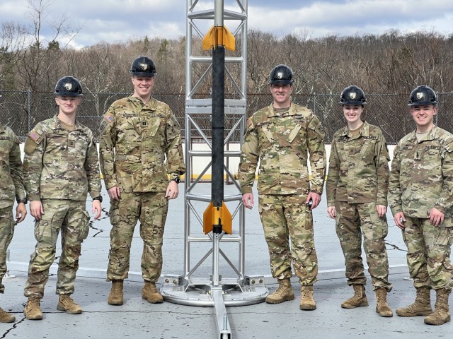 U.S. Military Academy (USMA) Space Engineering and Research Rocket Program cadets pose before launch of their two-staged rocket March 26, 2022 at West Point. The team is currently racing to be the first undergraduate group to reach the Karman Line. 

