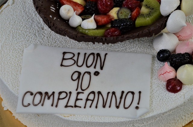 Soldiers from U.S. Army Garrison Italy return a birthday cake after 77 years