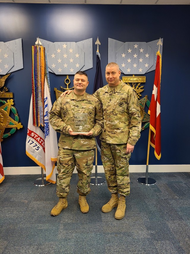 U.S. Army Sgt. 1st Class Andrew Sholtz (left), an inspector general noncommissioned officer assigned to 3rd Infantry Division, Fort Stewart, Georgia, poses for a photo with Sgt. Maj. Larry Orvis, the senior enlisted advisor for the Department of the Army Inspector General, at the Pentagon, April 20, 2022, after being awarded the title of Inspector General Noncommissioned Officer of the Year. The Office of the Inspector General provides impartial, objective and unbiased advice and oversight to Soldiers through relevant, timely and thorough inspection, assistance, investigations and training. (Courtesy Photo)