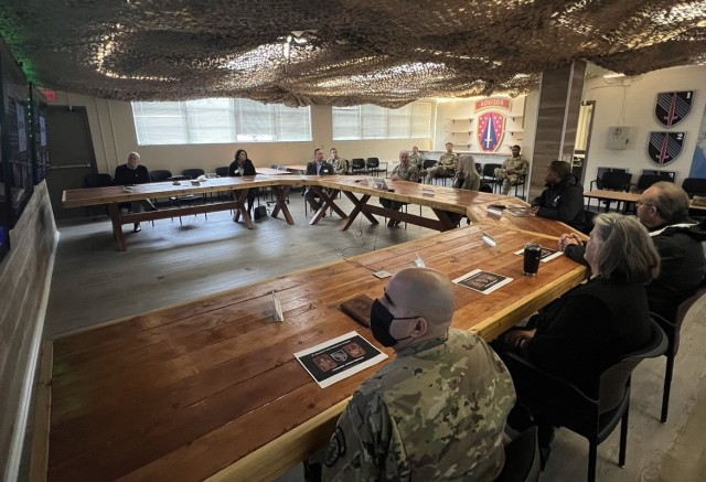 Olympia Community Connectors attend a briefing the the 5th Security Force Assistance Brigade.