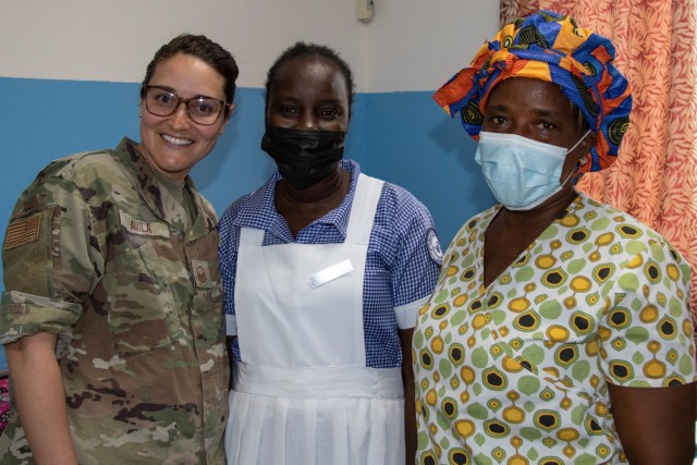 U.S. Air Force Master Sgt. Kristal Avila, health systems technician with 110th Medical Group, 110th Air Wing, Michigan Air National Guard, with Vorlor C. Ross, newborn intensive care unit nurse, and Zoe C. Giah, student nurse, at 14 Military...