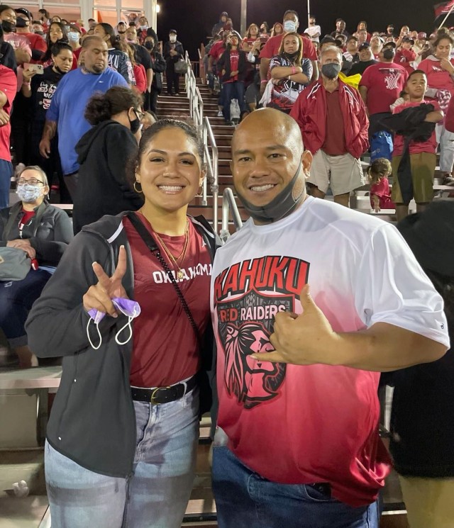 Kekua Aumua, right, a supervisory air traffic control specialist at Camp Zama, Japan, poses for a photo with Jocelyn Alo, a softball player at Oklahoma University who recently broke the NCAA record for career home runs. Aumua previously coached...
