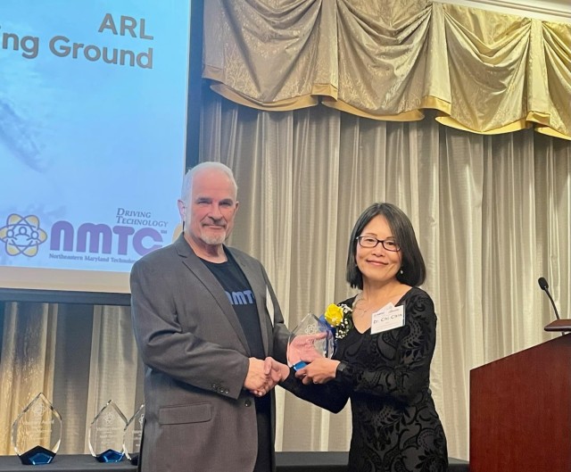 Dr. Chi-Chin Wu, a materials scientist at the U.S. Army Combat Capabilities Command, or DEVCOM, Army Research Laboratory receives the Mentor Award from Northeastern Maryland Technology Council’s executive director John Casner during the NMTC Visionary Awards Gala April 20. 