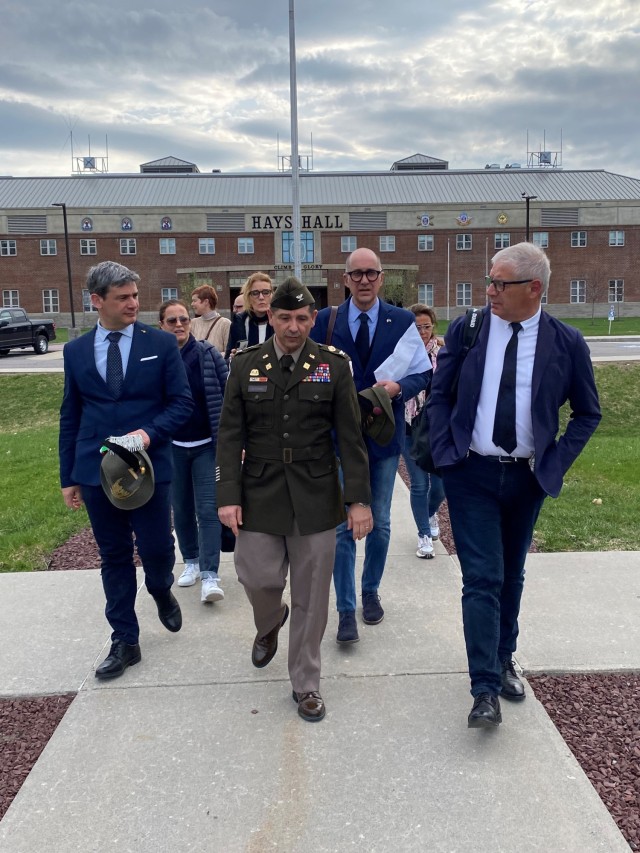 Col. James Zacchino Jr., Fort Drum garrison commander, welcomed Italian officials and guests April 25 on their first tour of a U.S. Army installation. The delegation included included Nicola Ferronato, mayor of Caldogno, Renzo Marangon, mayor of Camisano Vicentino, and Andrea Nardin, mayor of Montegalda.  The visit coincided with Italian Liberation Day that marks the end of Nazi occupation at the end of World War Two. To honor the occasion, officials placed a wreath near the grave of an Italian soldier buried at the Fort Drum Prisoner of War Cemetery. 