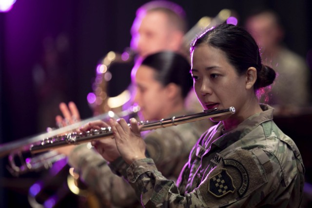 Army Reserve Sgt. Christine Won performs during a band competition at Joint Base McGuire-Dix-Lakehurst, N.J., April 9, 2022.