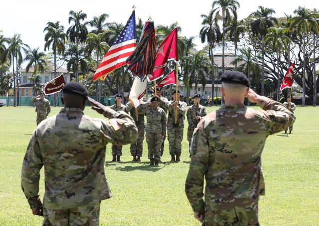 Command Sgt. Maj. Fergus J. Joseph, left, and Brig. Gen. Edward H. Bailey, commanding general of Regional Health Command-Pacific, salute the colors during Joseph&#39;s assumption of responsibility ceremony at Fort Shafter, Hawaii, May 9, 2022.