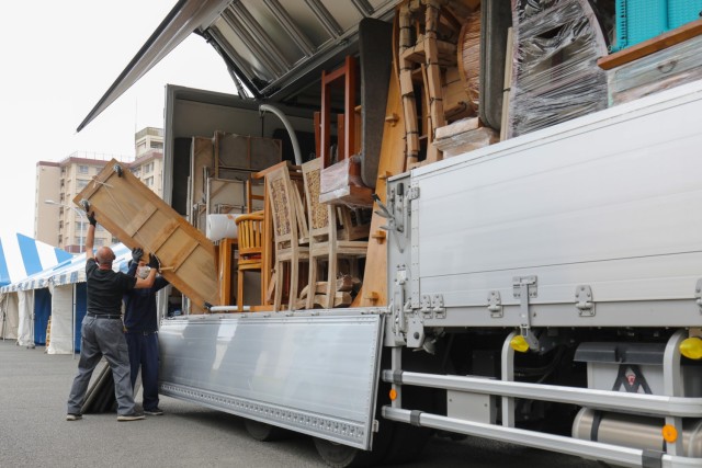 Vendors unload furniture items that will be sold during a spring bazaar at the Camp Zama Community Club, Japan, May 12, 2022. The club will hold its spring bazaar May 14 from 9 a.m. to 5 p.m. and May 15 from 10 a.m. to 4 p.m. It will offer customers a variety of items from antiques, furniture, jewelry, toys, carpets, paintings to trinkets and other Japanese souvenirs that can add flair to a home or be mailed back to family and friends.