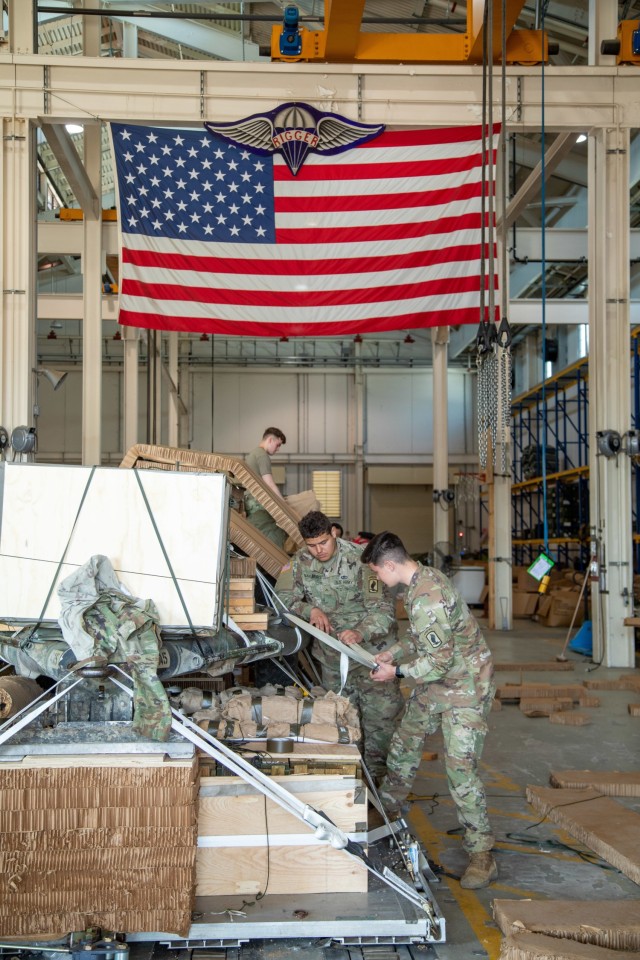 173rd Airborne Brigade Soldiers Pre Load A Gun-Truck Combo as Exercise Swift Response begins