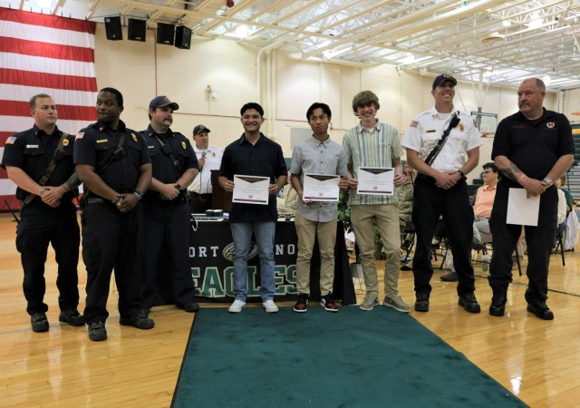 Five Fort Knox Middle High School Class of 2022 seniors receive recognition May 10 for their participation in firefighter training to obtain the 150-hour state of Kentucky certification.