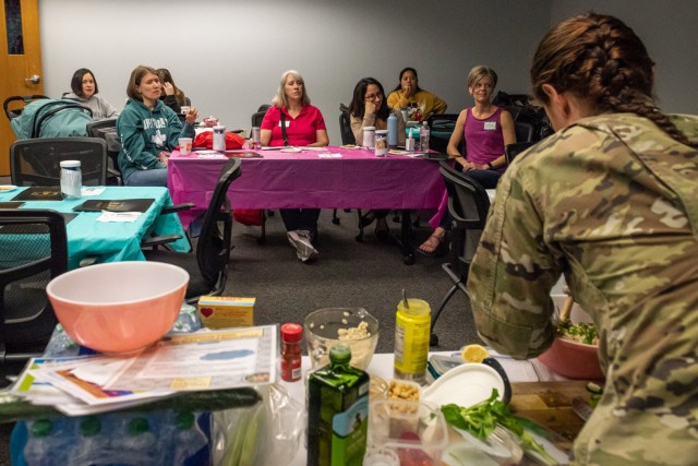 1st Lt. Cara Adams, a registered dietitian and the chief of General Leonard Wood Army Community Hospital Nutrition Care Division’s Outpatient Nutrition Clinic, teaches a healthy meal preparation class to military spouses at Army Community Service, as part of their Military Spouse Appreciation Day event. Adams provided the students with a recipe for a lemon basil whole grain salad, demonstrated how to make the meal and provided samples to taste at the end. Fort Leonard Wood’s ACS team hosted a day of activities, food and education to recognize the resilience of military spouses and the roles they play in the readiness of America’s armed forces. 