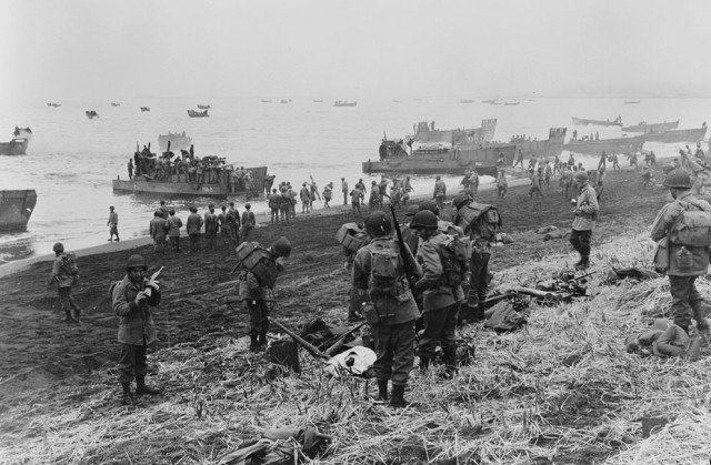 American troops assemble at Massacre Bay, Attu, Aleutian Islands, US Territory of Alaska,  on May 11, 1943 during the invasion of Attu.